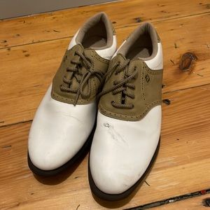Foot joy golf shoes. Used once!White and tan saddle shoes